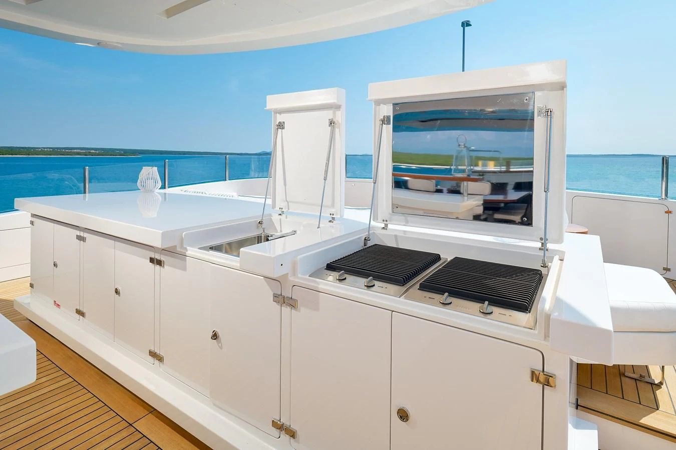 a kitchen with white cabinets aboard LADY MRD Yacht for Charter
