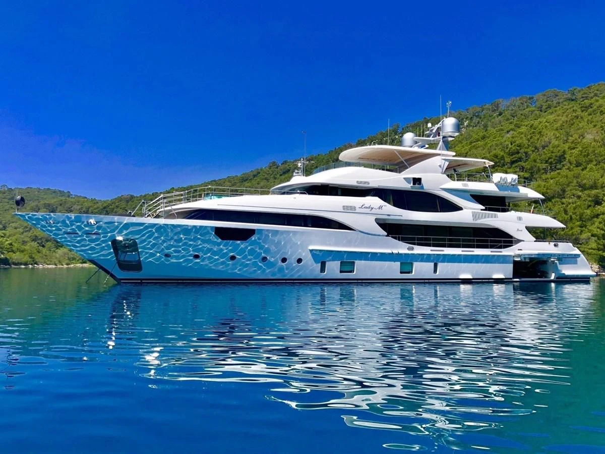 a white yacht on the water aboard LADY MRD Yacht for Charter