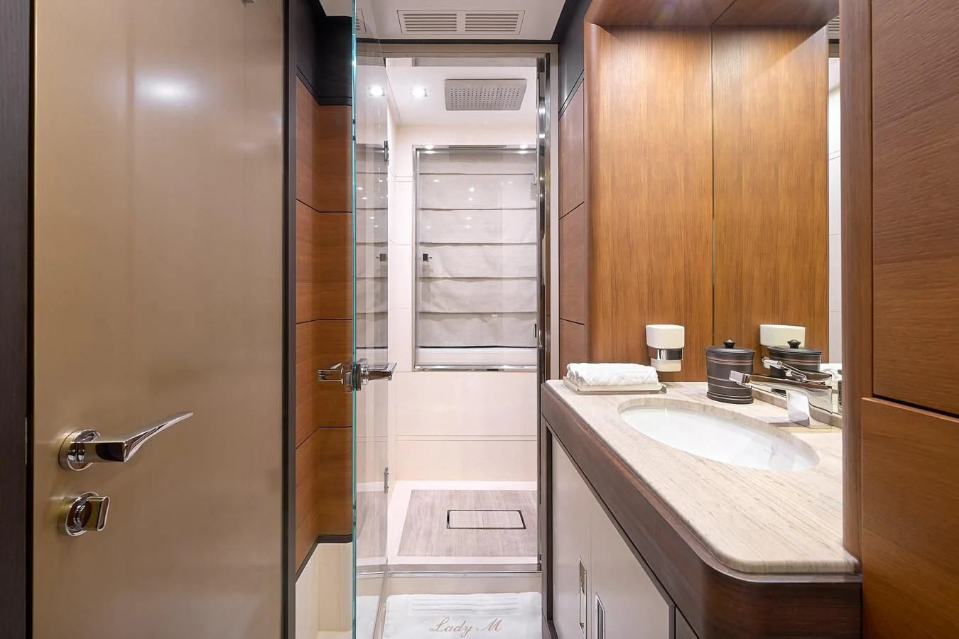 a bathroom with a sink and a shower aboard LADY MRD Yacht for Charter