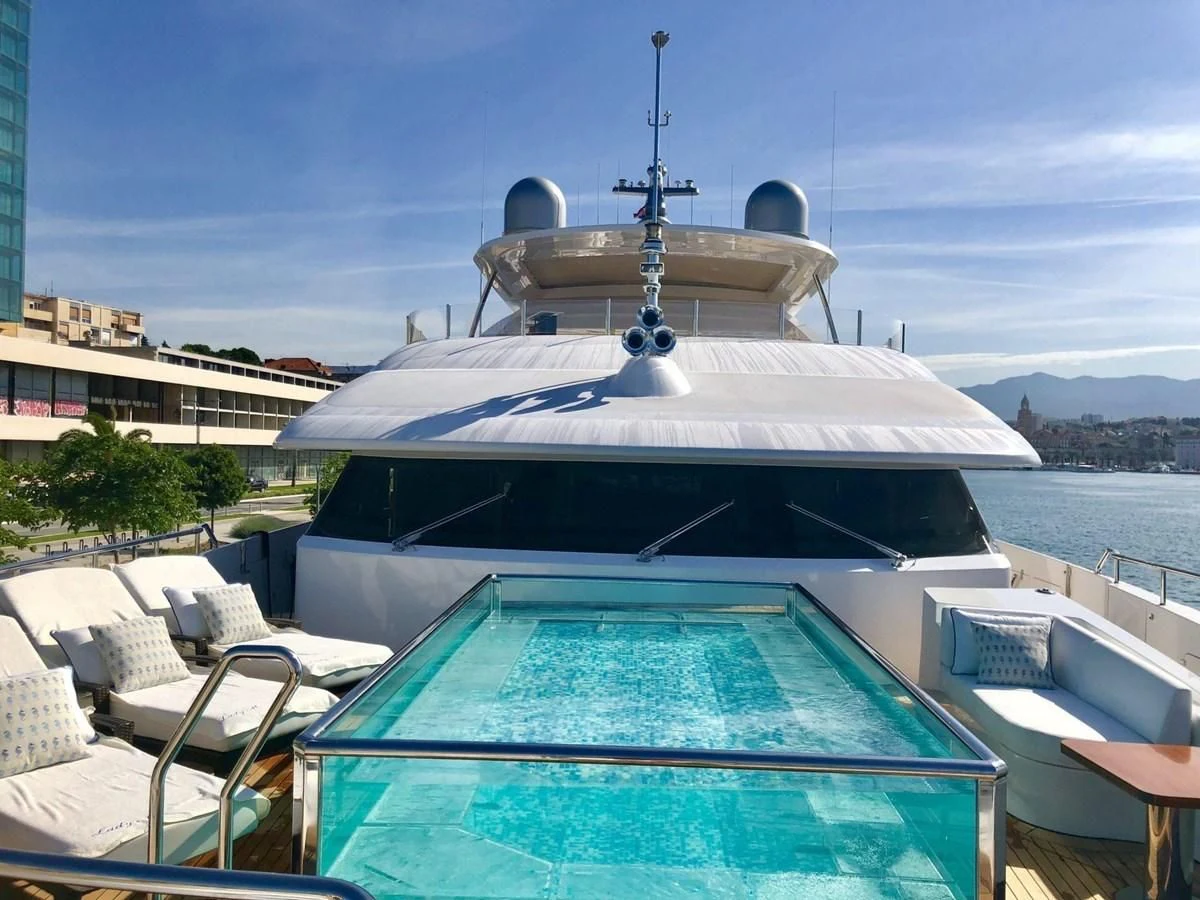 a boat docked at a pier aboard LADY MRD Yacht for Charter