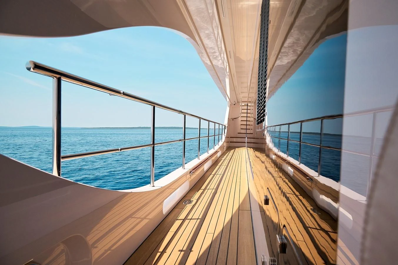 a wooden deck overlooking a body of water aboard LADY MRD Yacht for Charter