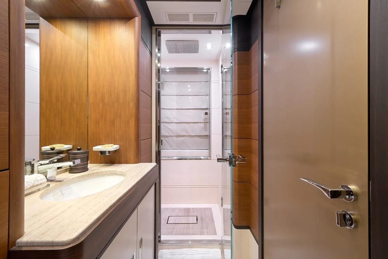 a bathroom with a sink and a shower unit aboard LADY MRD Yacht for Charter