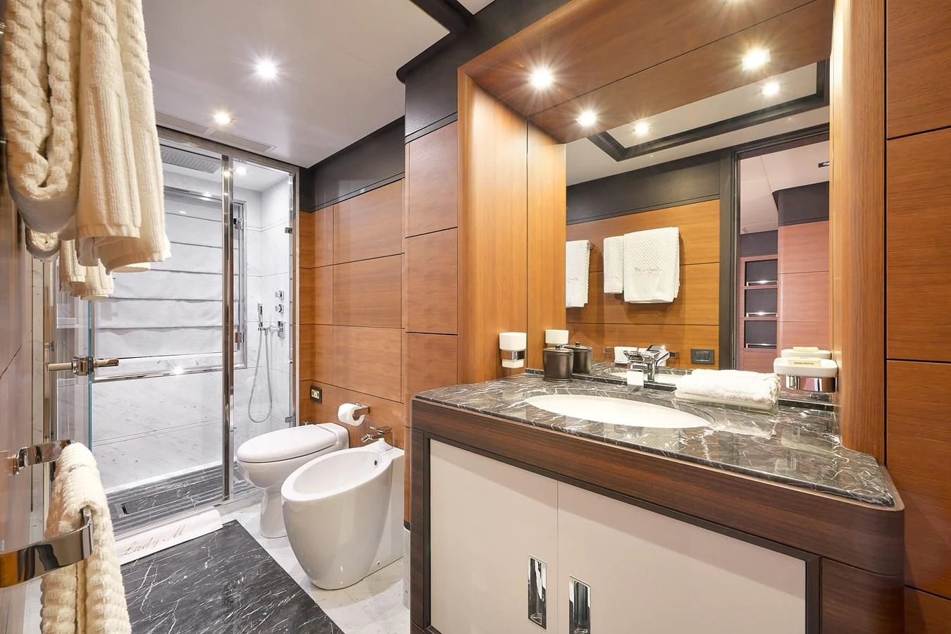a bathroom with a large mirror aboard LADY MRD Yacht for Charter