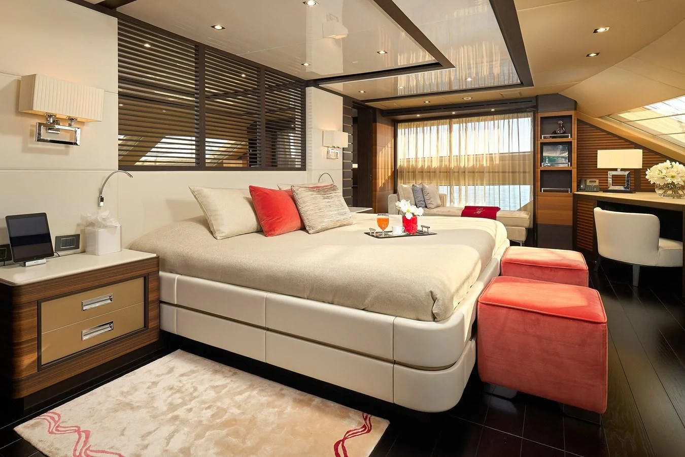 a room with a bed and a desk aboard LADY MRD Yacht for Charter