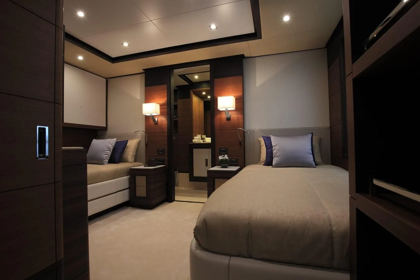 a hotel room with a bed and a white bed aboard LADY MRD Yacht for Charter