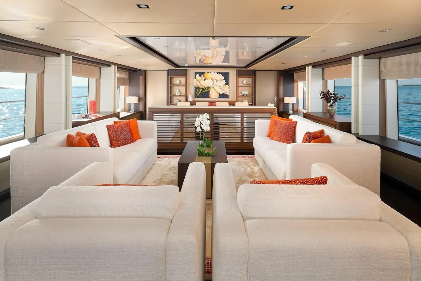 a living room with white couches aboard LADY MRD Yacht for Charter