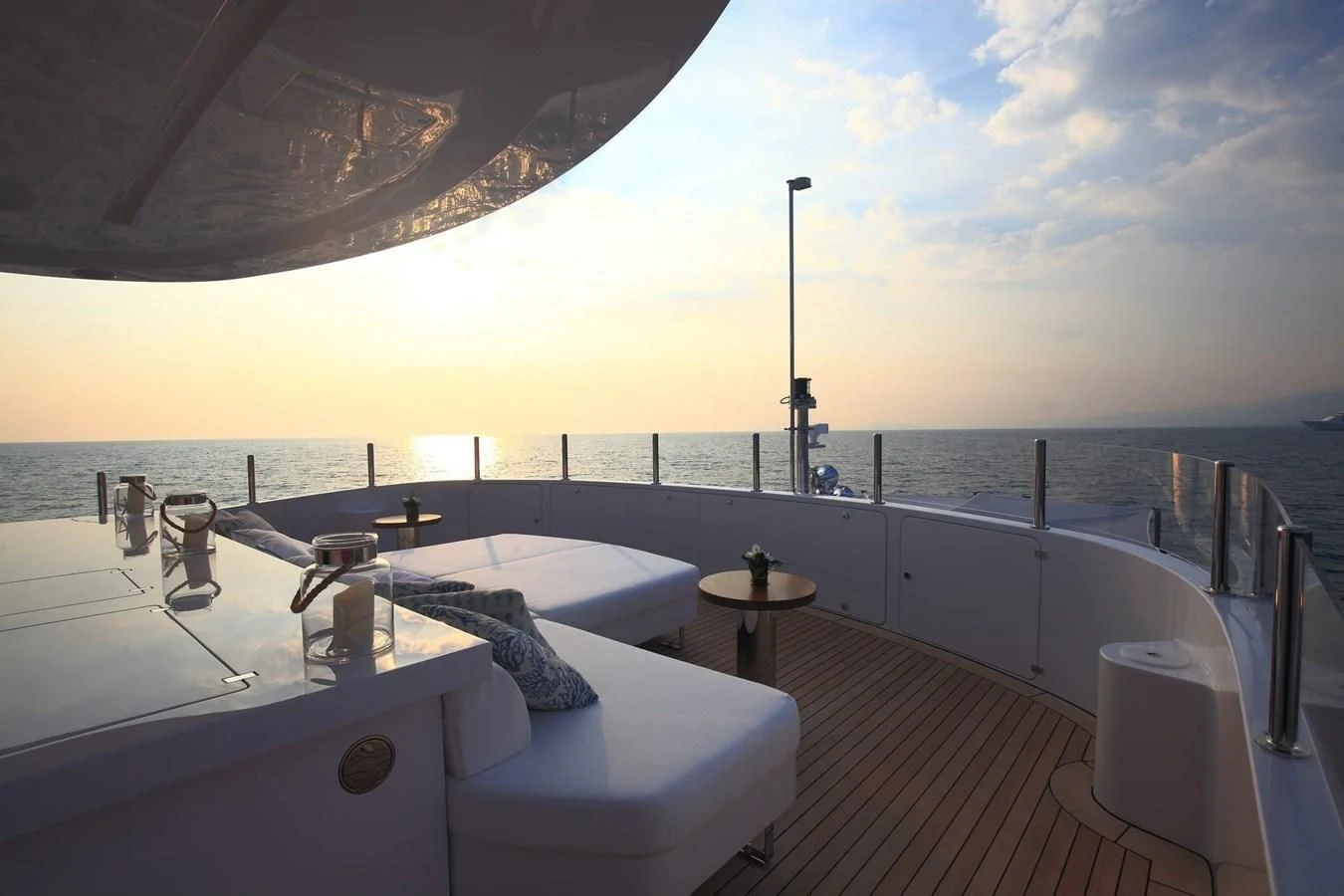 a large white bathtub with a large body of water in the background aboard LADY MRD Yacht for Charter