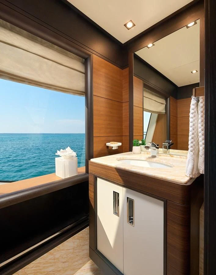 a bathroom with a large window aboard LADY MRD Yacht for Charter