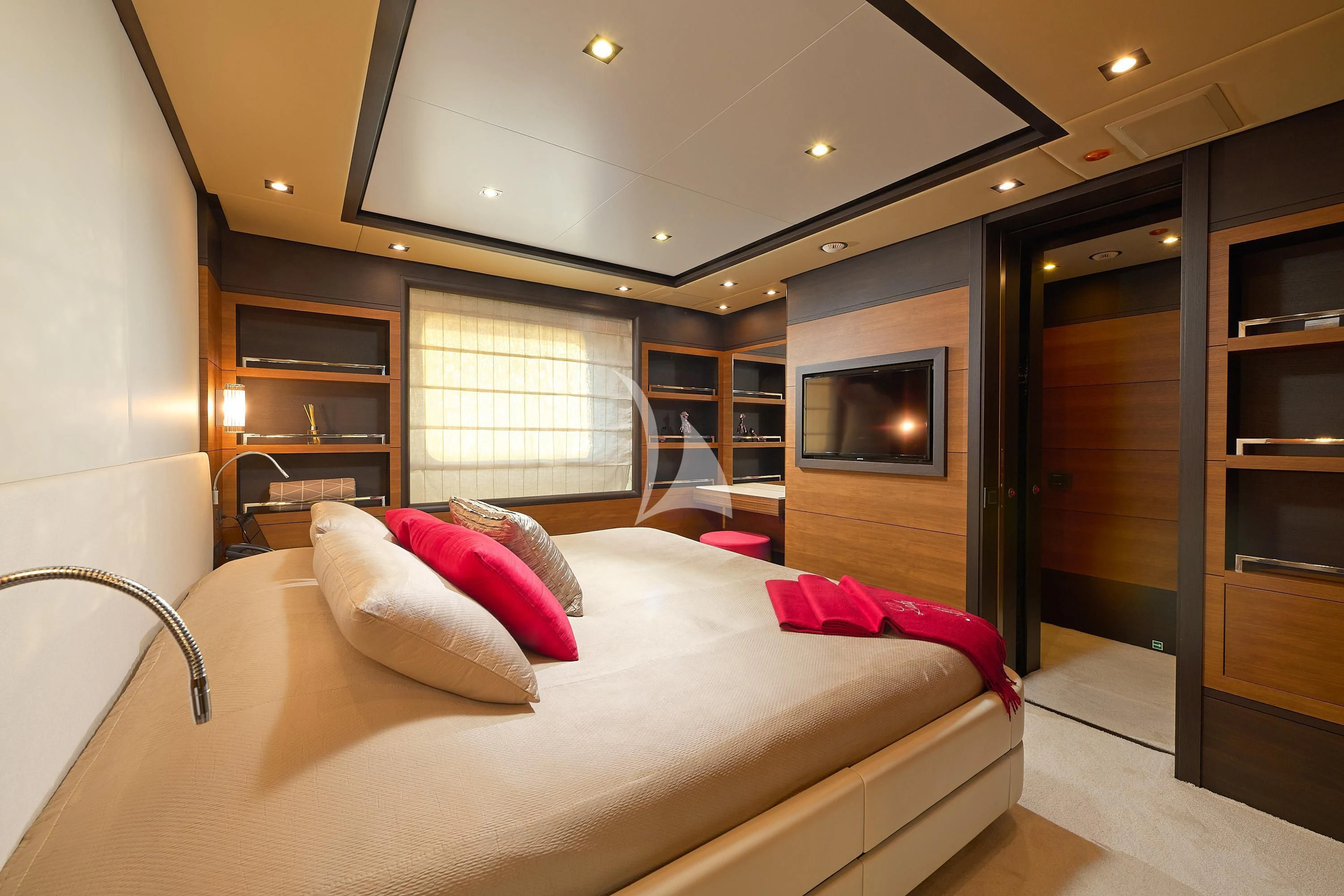 a bedroom with a large bed aboard LADY MRD Yacht for Charter