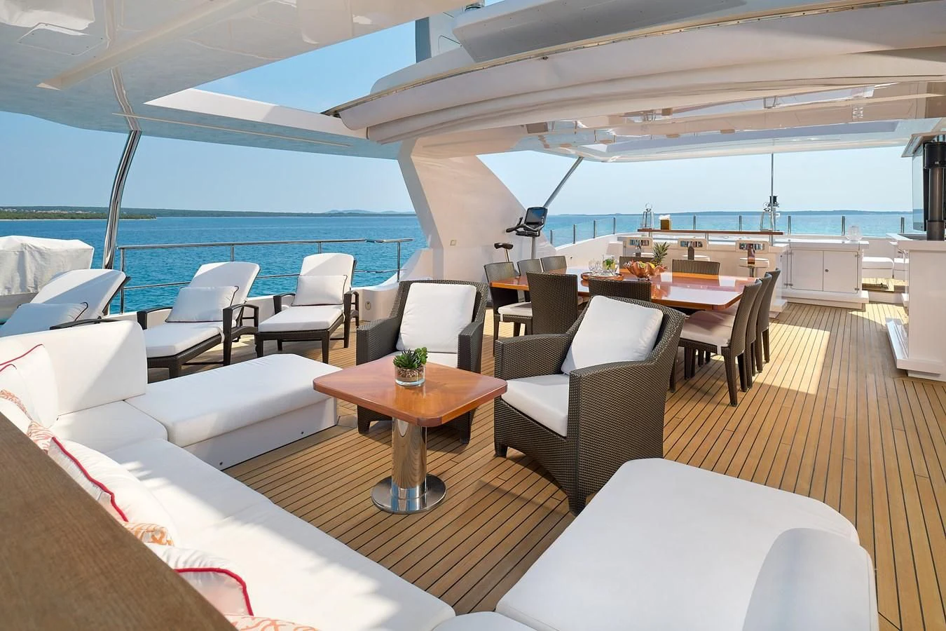 a room with a table and chairs aboard LADY MRD Yacht for Charter