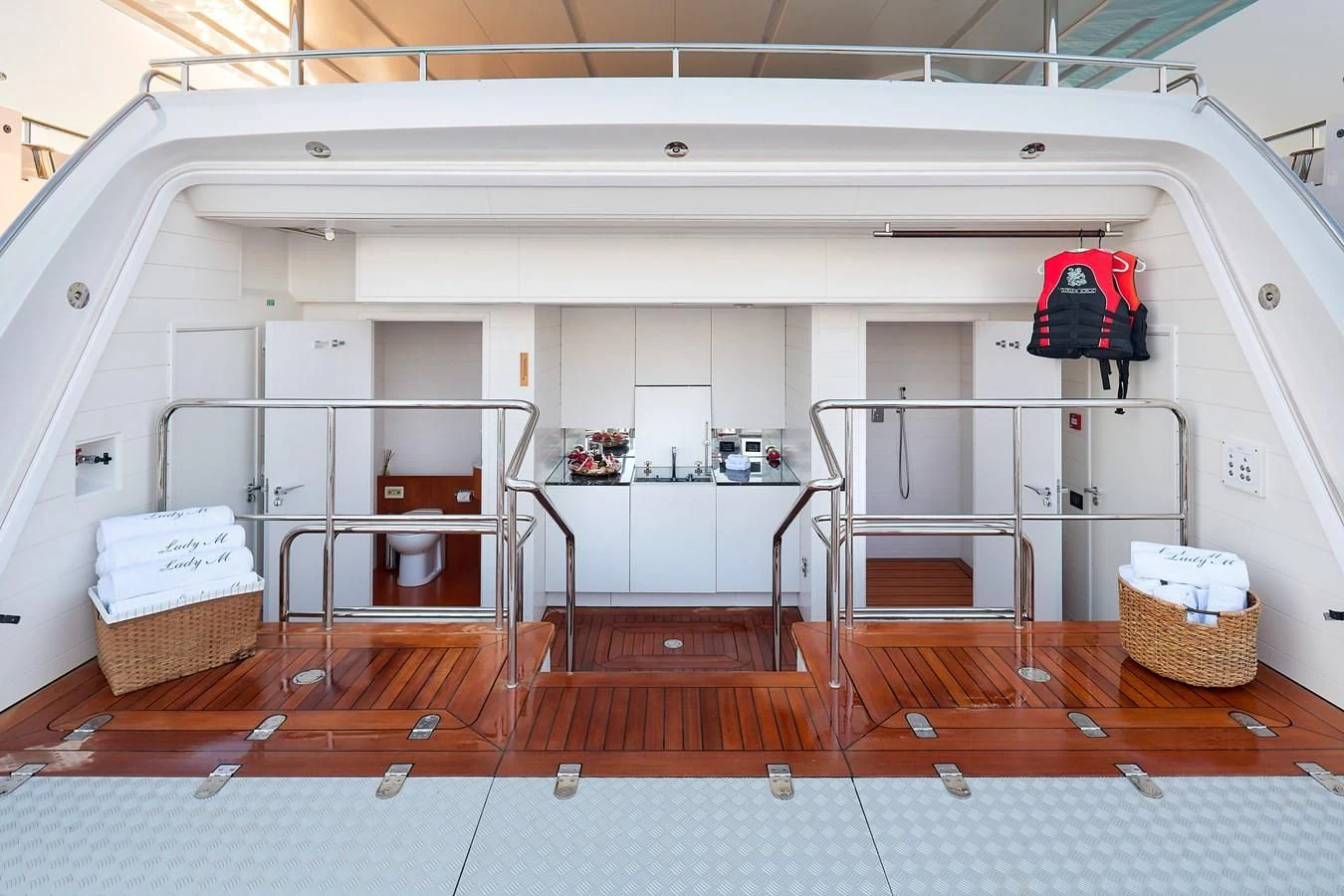 a room with a red bag and a red bag on the wall aboard LADY MRD Yacht for Charter