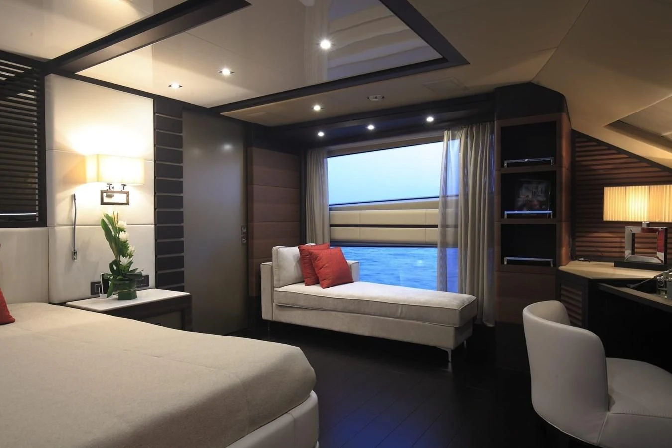 a room with a bed and a window aboard LADY MRD Yacht for Charter