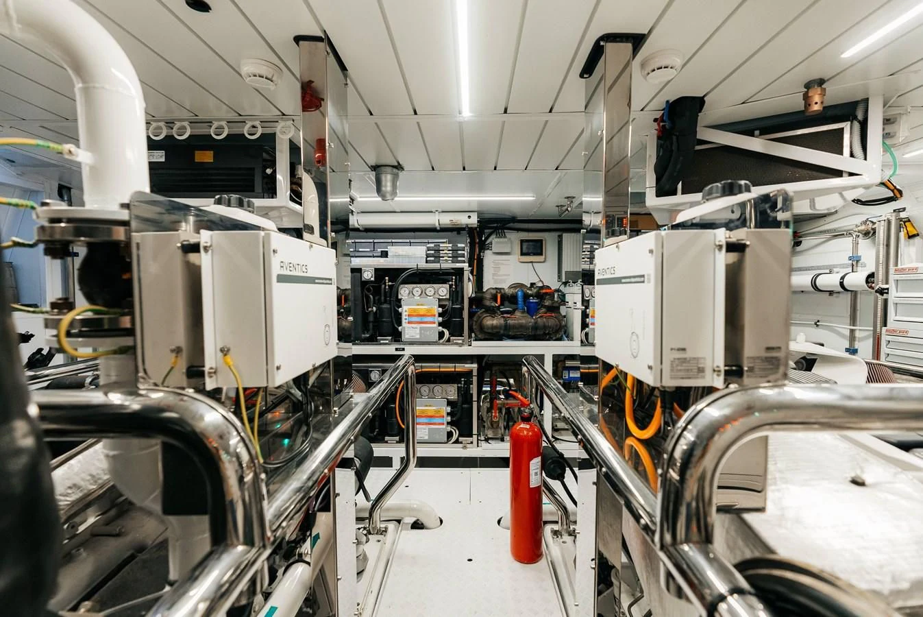 a large machine in a factory aboard PEARL Yacht for Sale