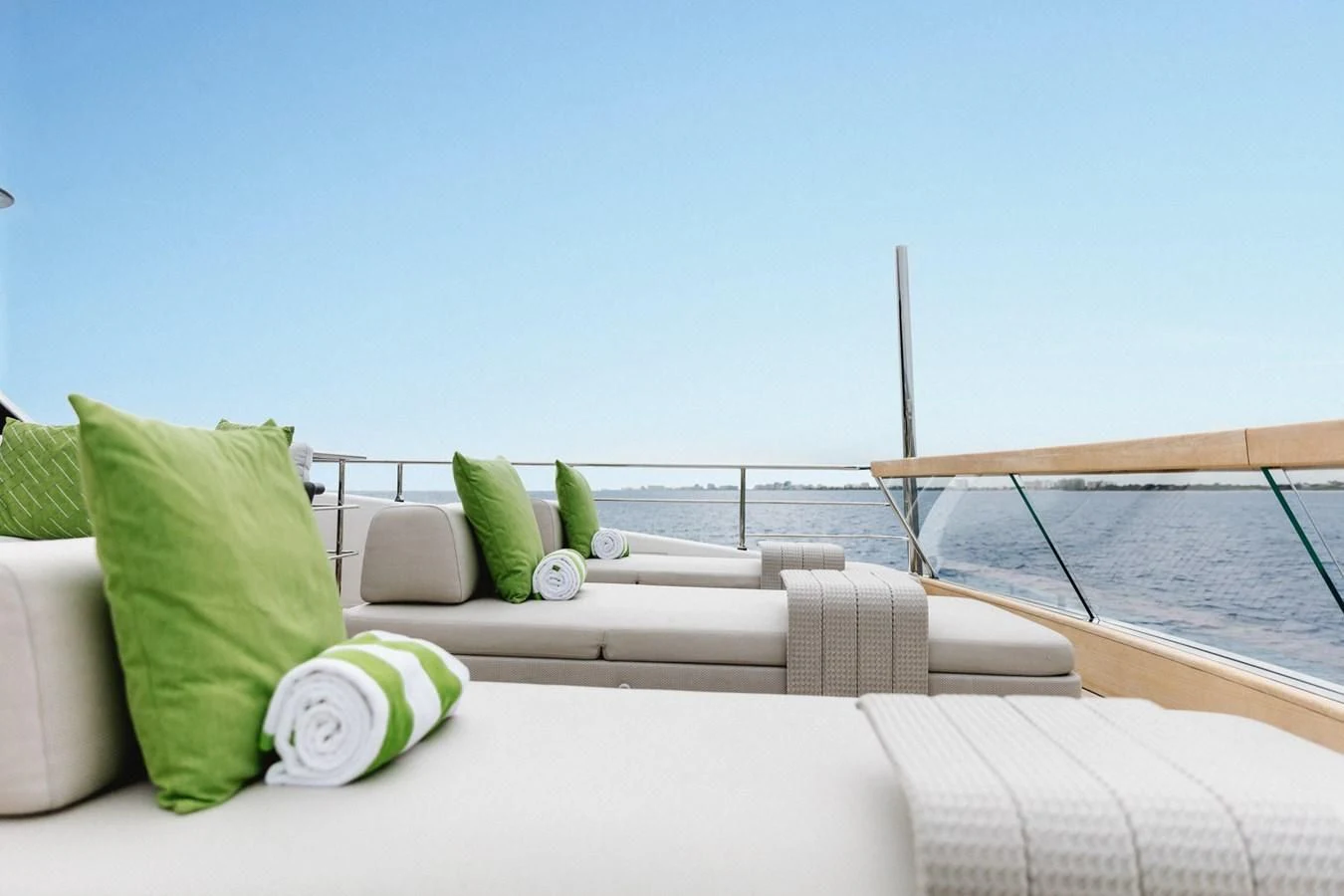 a bed with pillows and pillows aboard PEARL Yacht for Sale