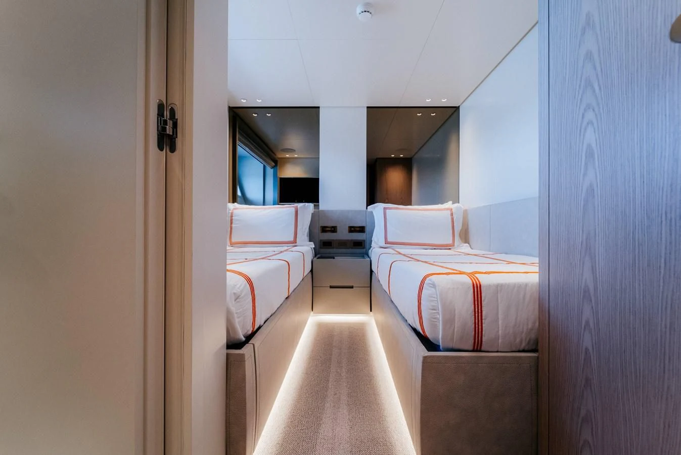a room with a bed and a window aboard PEARL Yacht for Sale