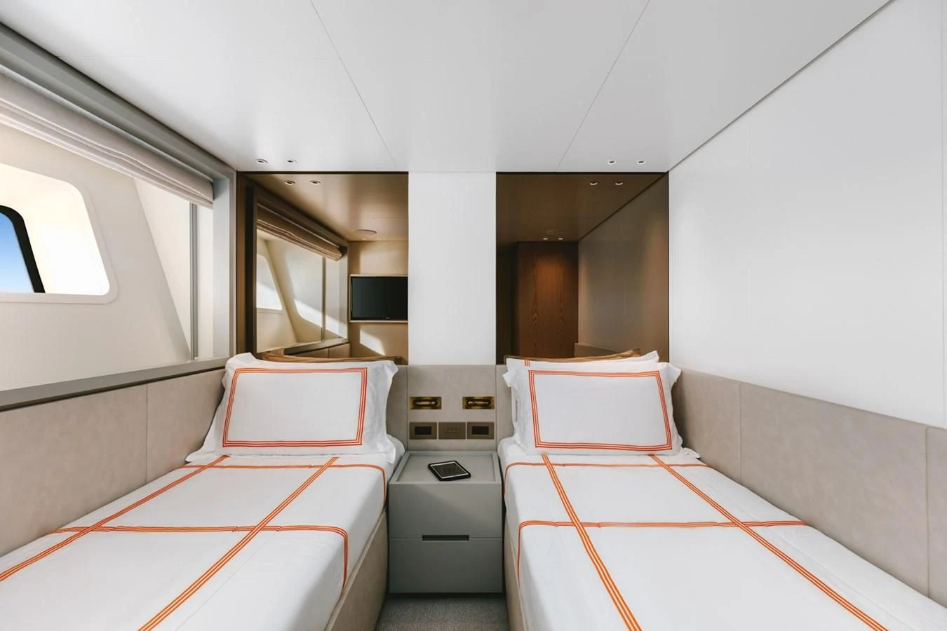 a room with a bed and a sink aboard PEARL Yacht for Sale
