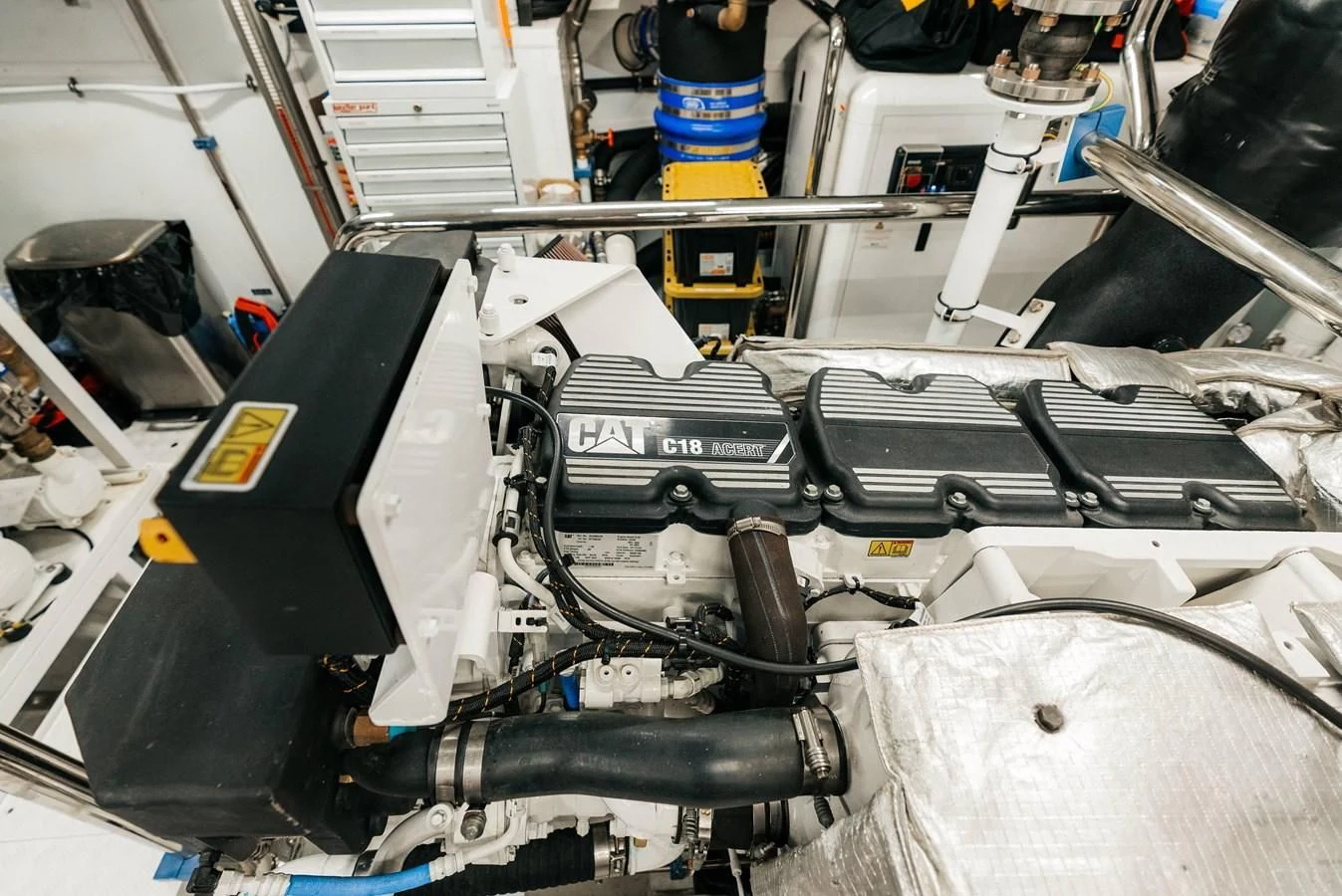a car engine with a black hood aboard PEARL Yacht for Sale