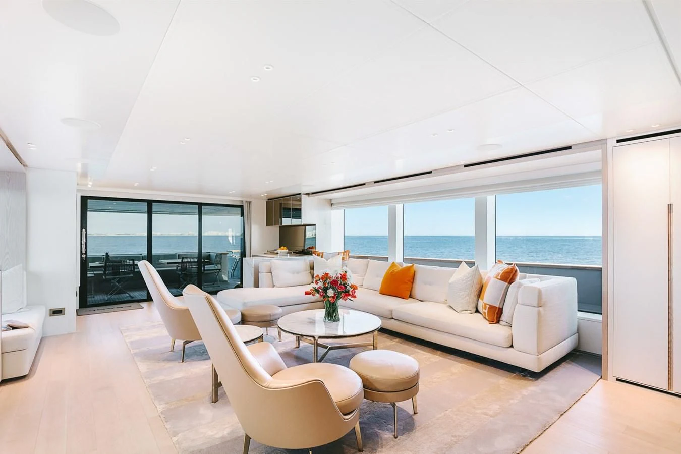 a living room with a large window aboard PEARL Yacht for Sale