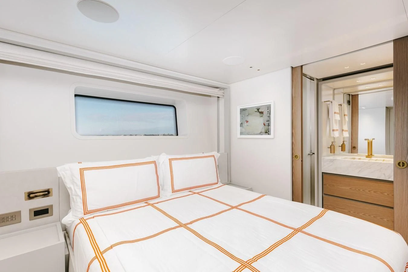 a bedroom with a bed aboard PEARL Yacht for Sale