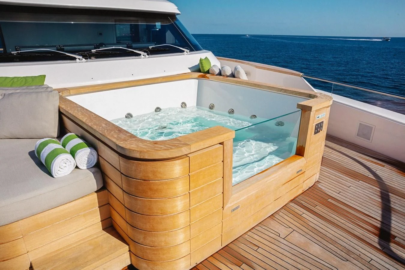 a wooden boat on a deck aboard PEARL Yacht for Sale