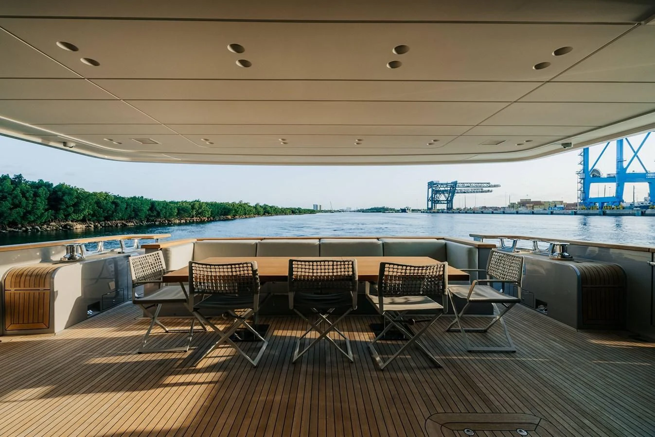 a deck with chairs and tables aboard PEARL Yacht for Sale