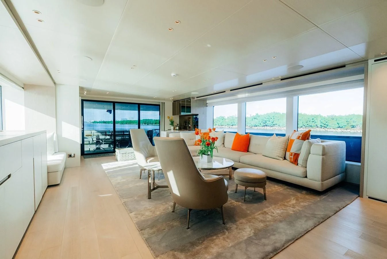 a living room with a large window aboard PEARL Yacht for Sale