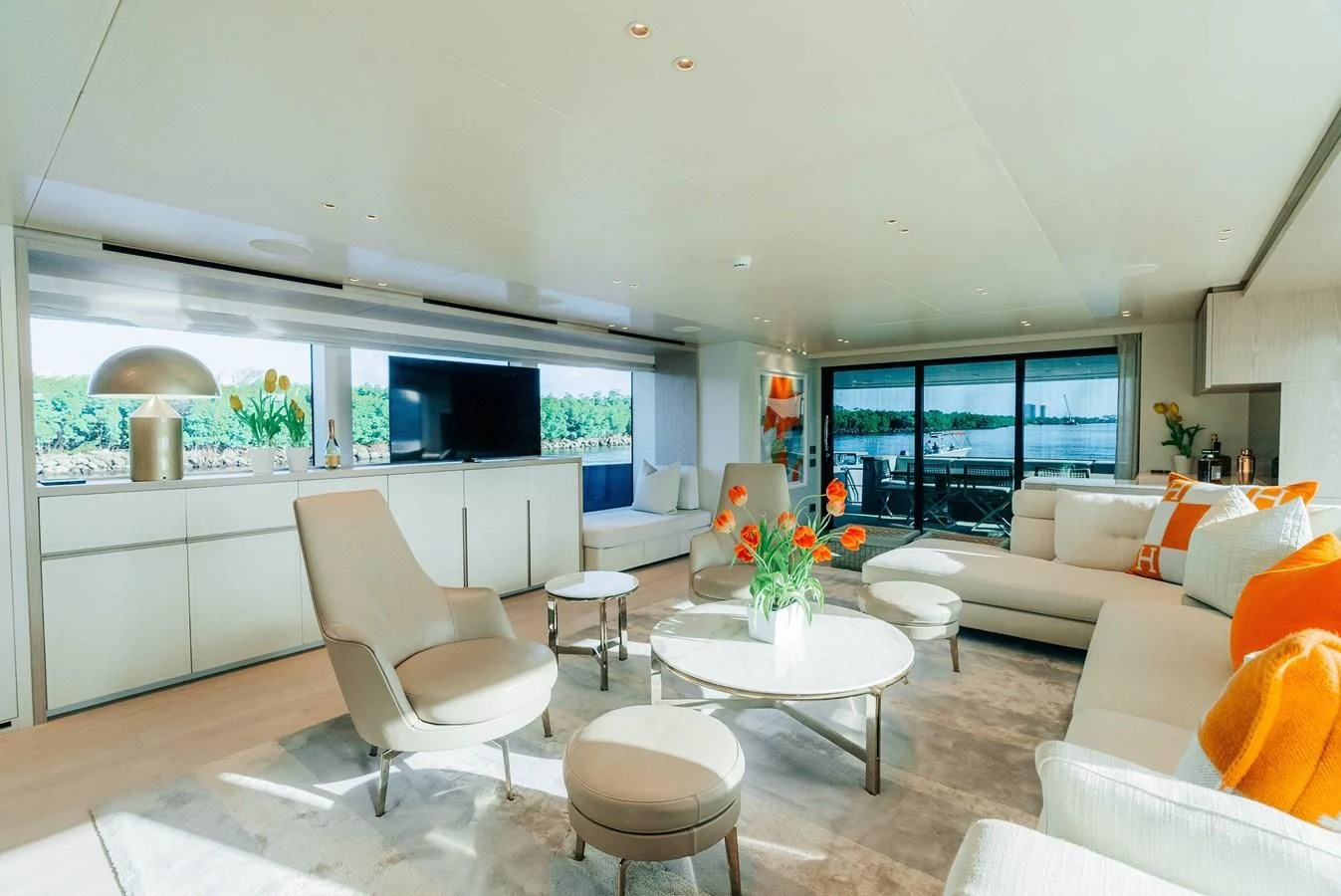 a living room with a large window aboard PEARL Yacht for Sale