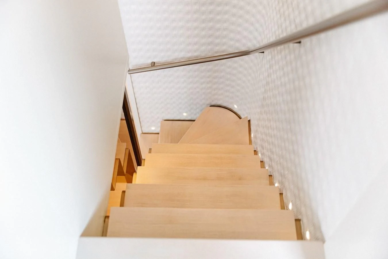 a wooden staircase with a light on top aboard PEARL Yacht for Sale
