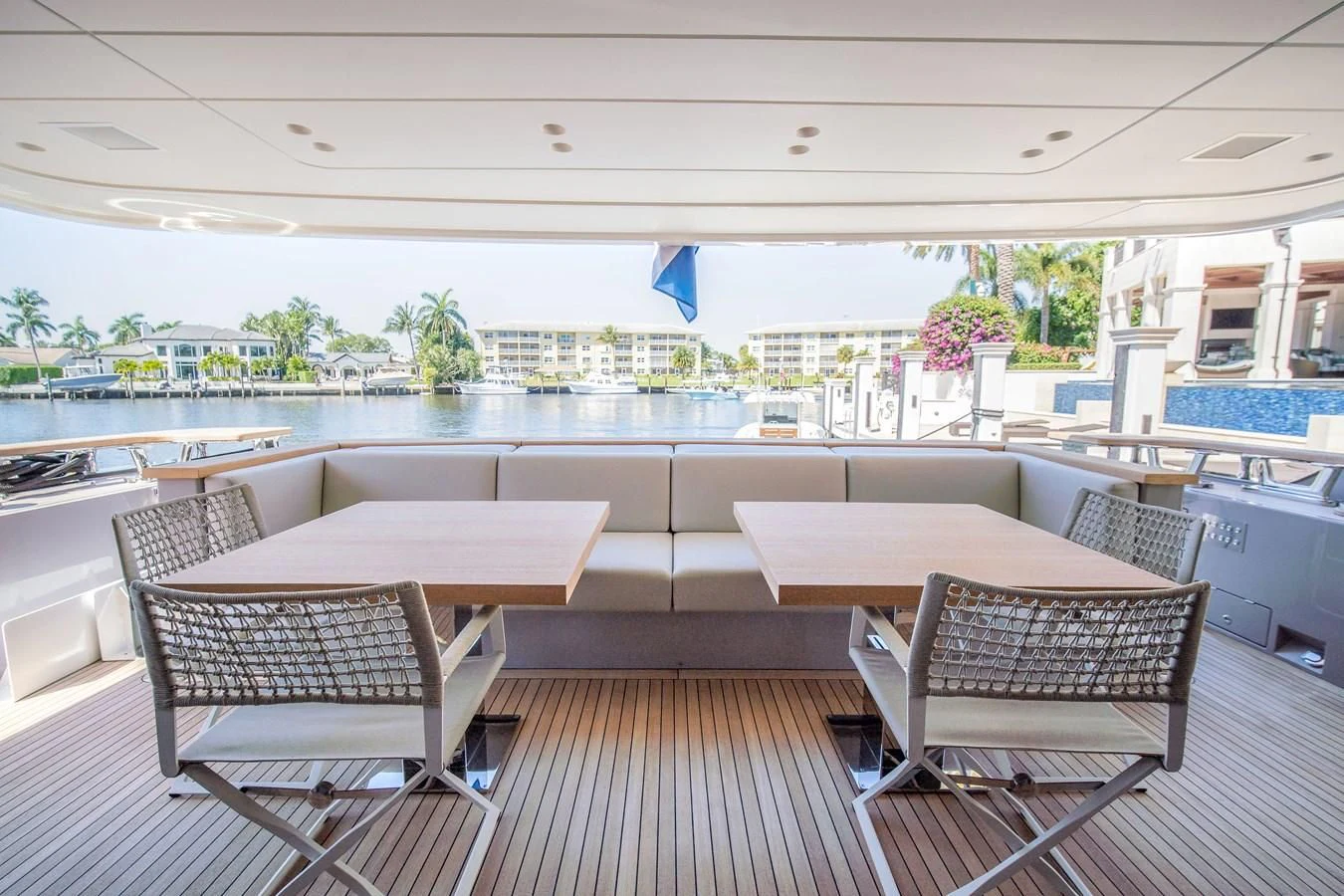 a deck with chairs and tables aboard PEARL Yacht for Sale