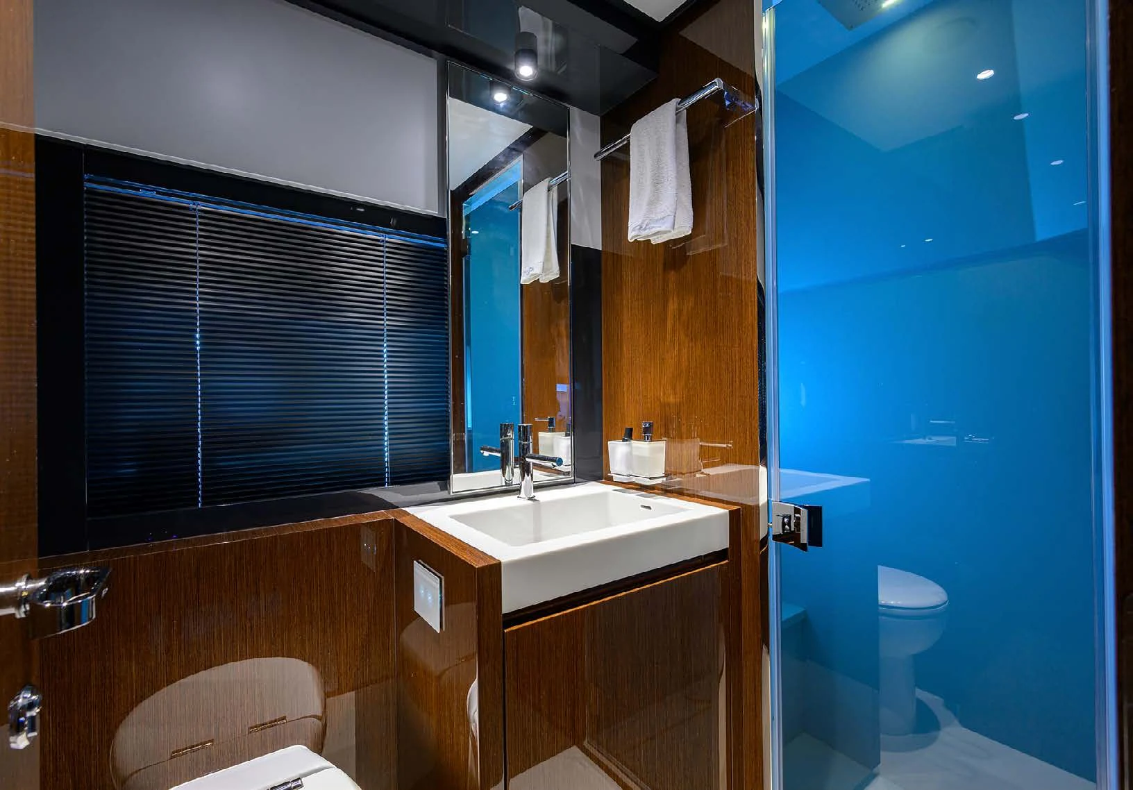 a bathroom with a sink and a toilet aboard JACQPOT Yacht for Sale