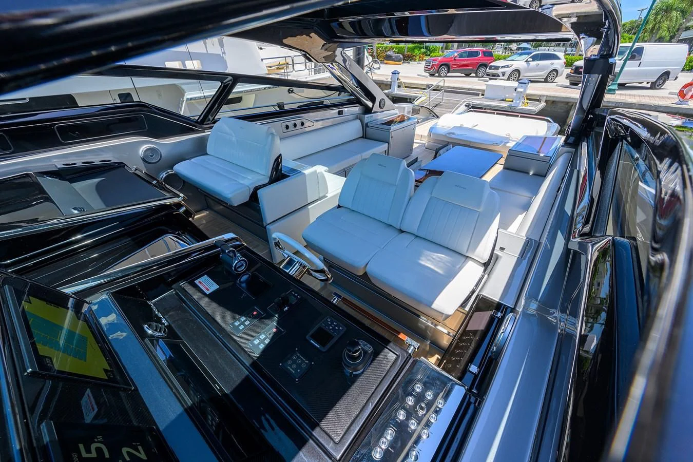 a car with a large stack of boxes in it aboard JACQPOT Yacht for Sale