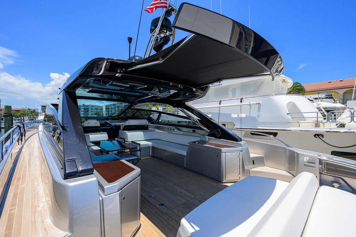 a boat with a large glass roof aboard JACQPOT Yacht for Sale