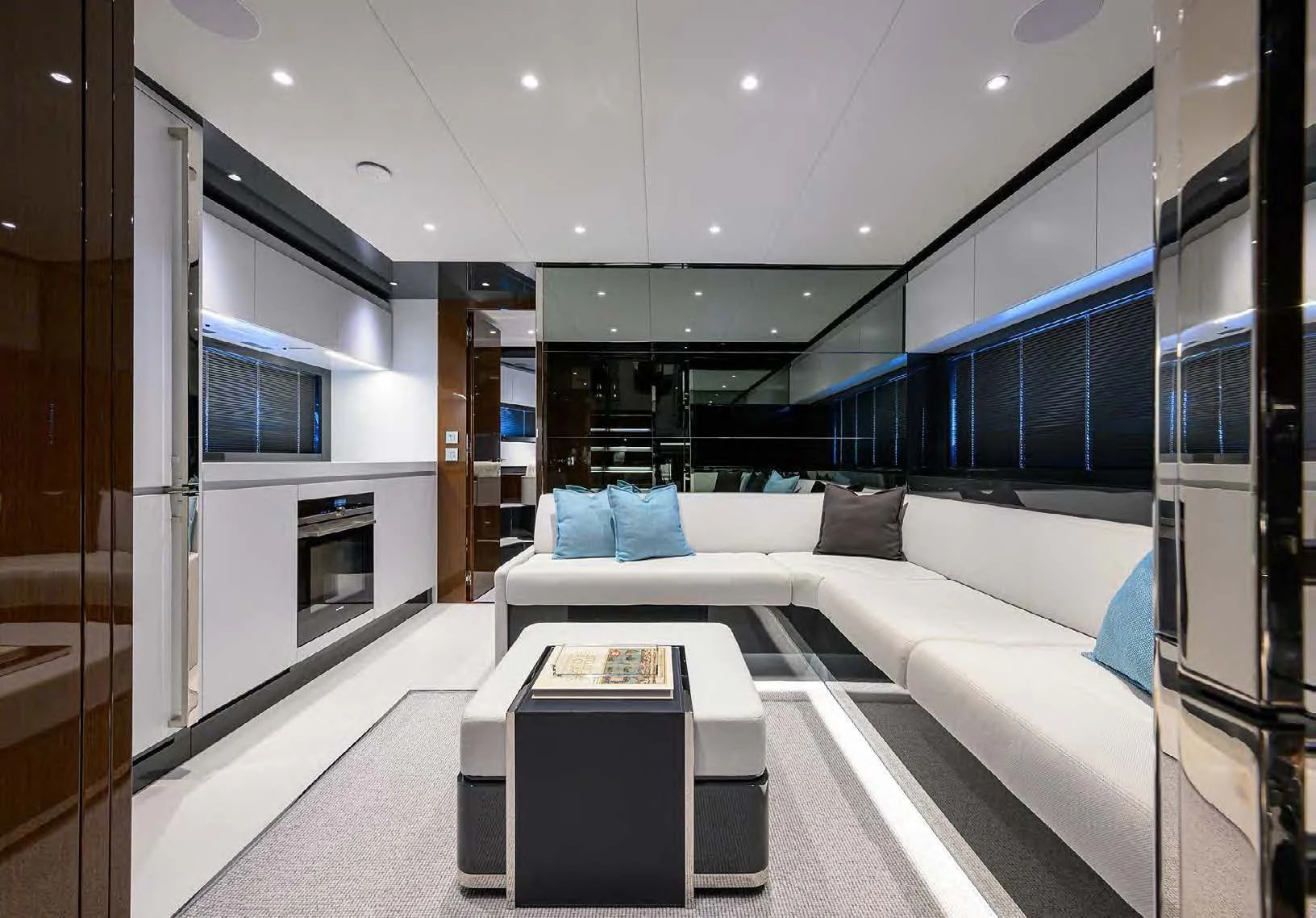 a room with a bed and a table aboard JACQPOT Yacht for Sale