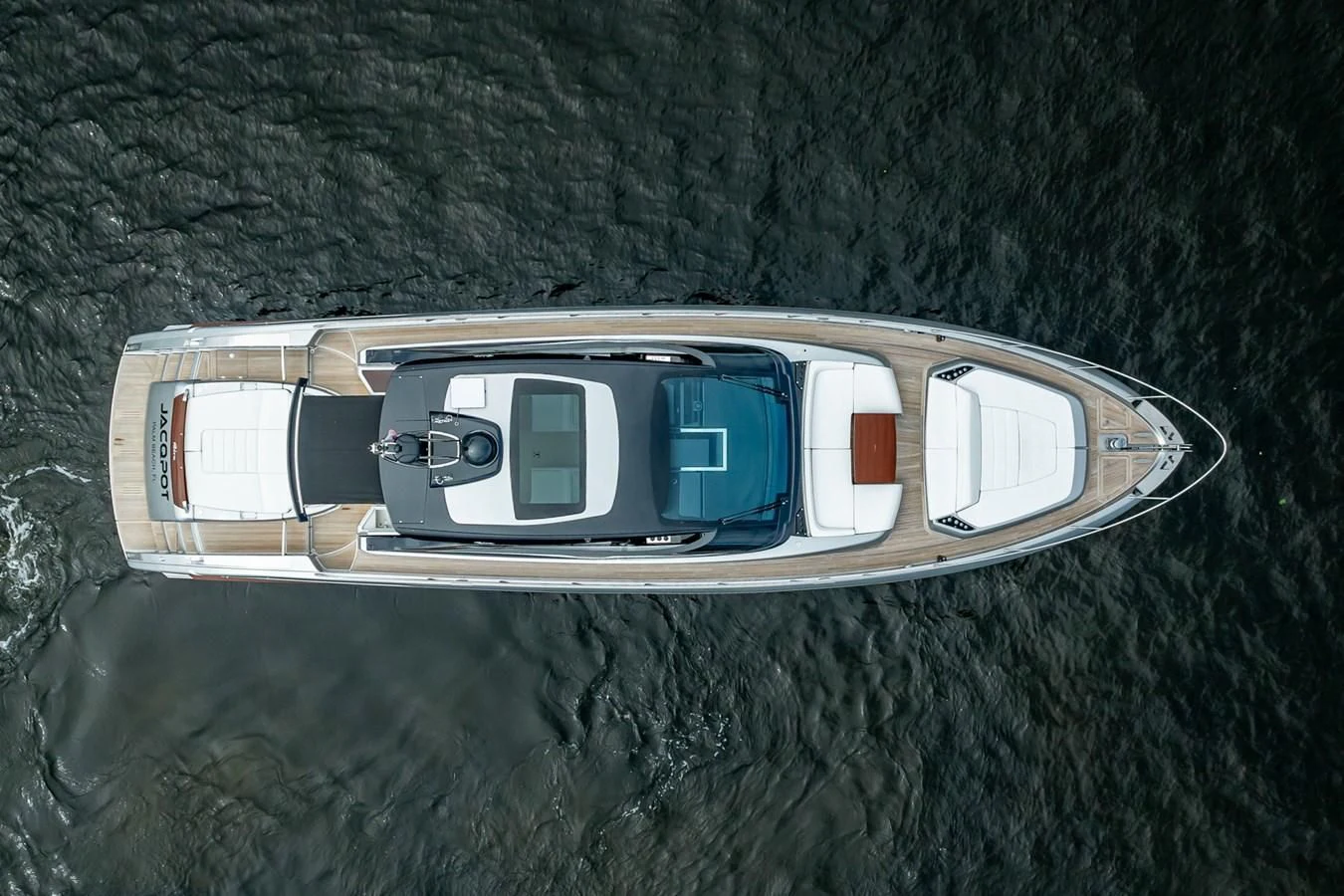 a car with a screen on the side aboard JACQPOT Yacht for Sale