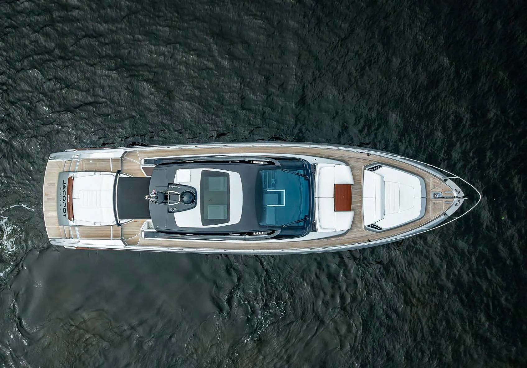 a car with a screen on the side aboard JACQPOT Yacht for Sale