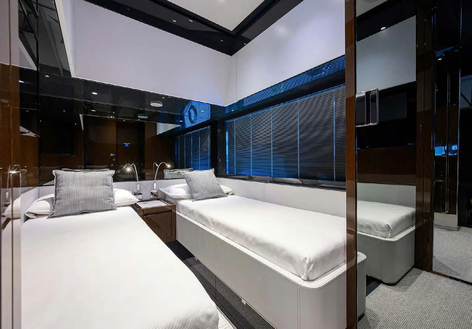 a room with two beds aboard JACQPOT Yacht for Sale