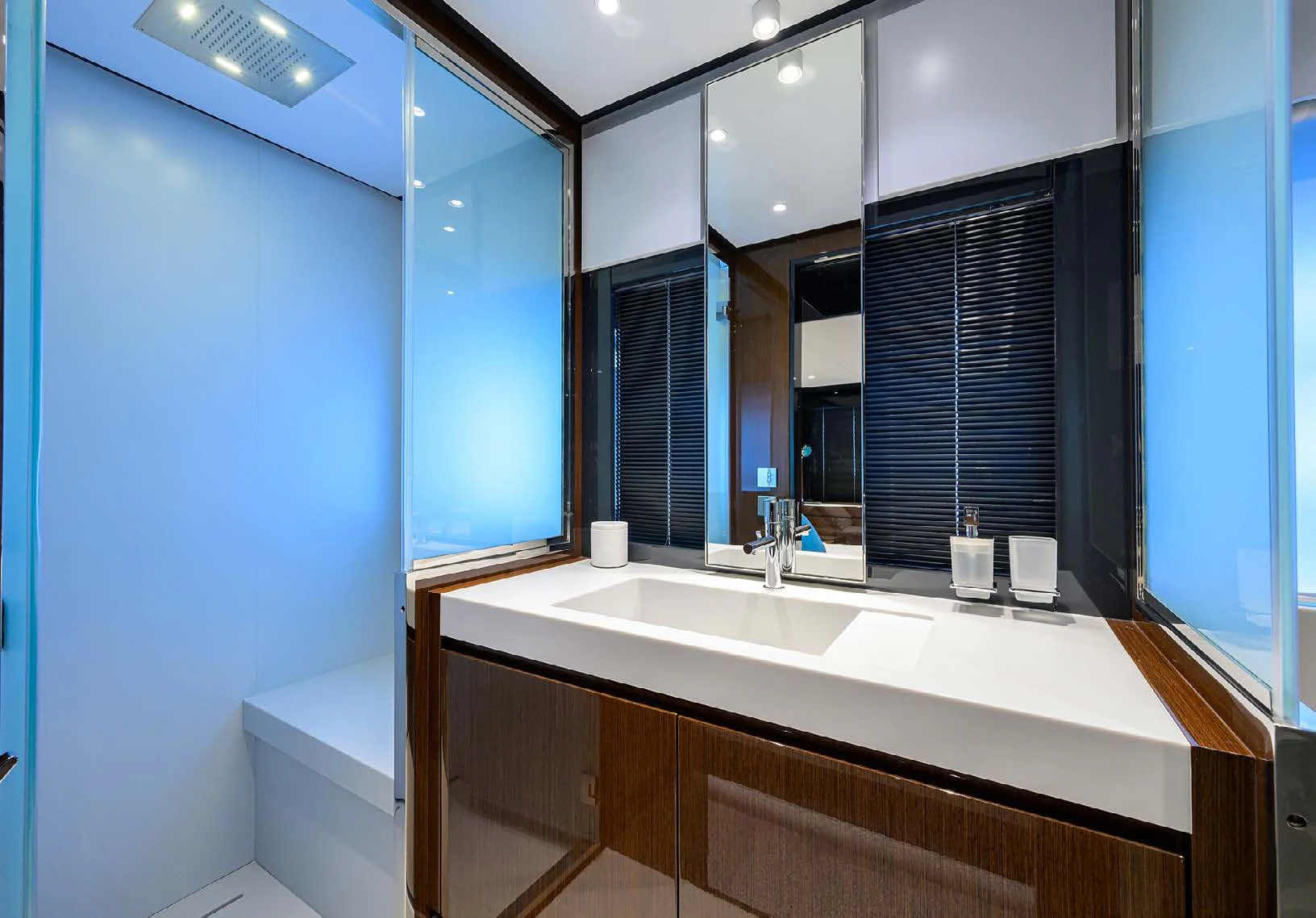 a bathroom with a sink and cabinets aboard JACQPOT Yacht for Sale