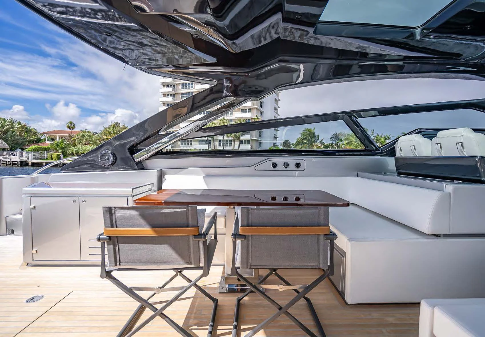 a white car with a large windshield aboard JACQPOT Yacht for Sale
