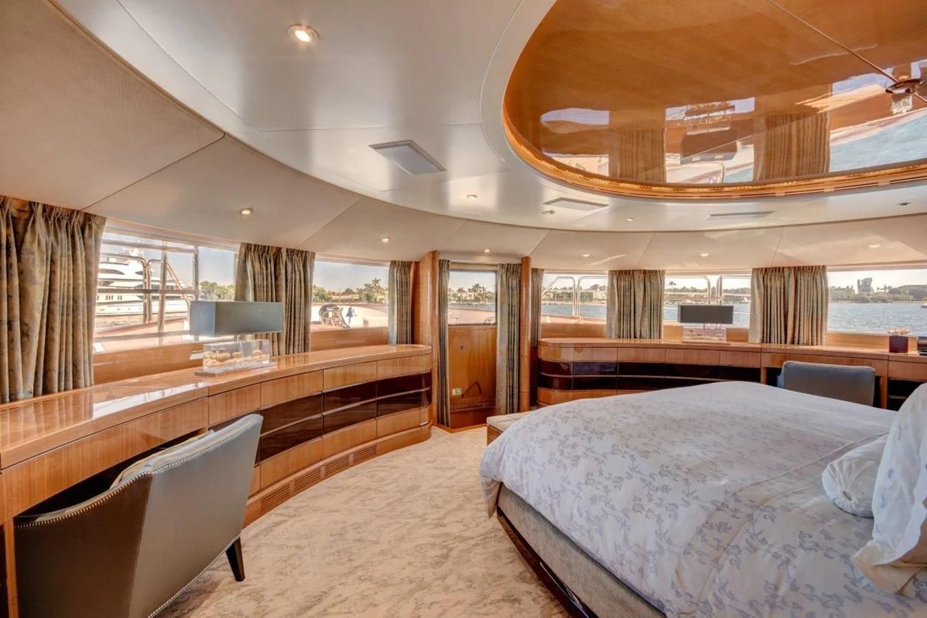 a room with a bed and a desk aboard GROOVER Yacht for Sale