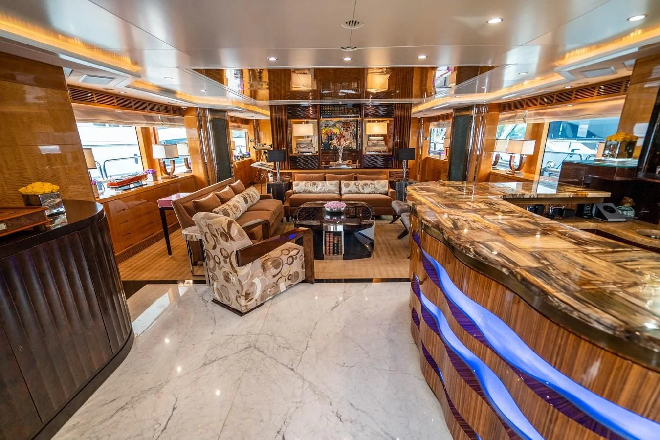 a room with a couch and a table aboard GROOVER Yacht for Sale