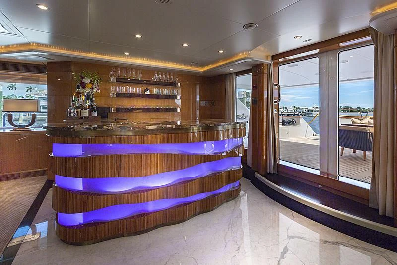 a large purple bed in a room aboard GROOVER Yacht for Sale