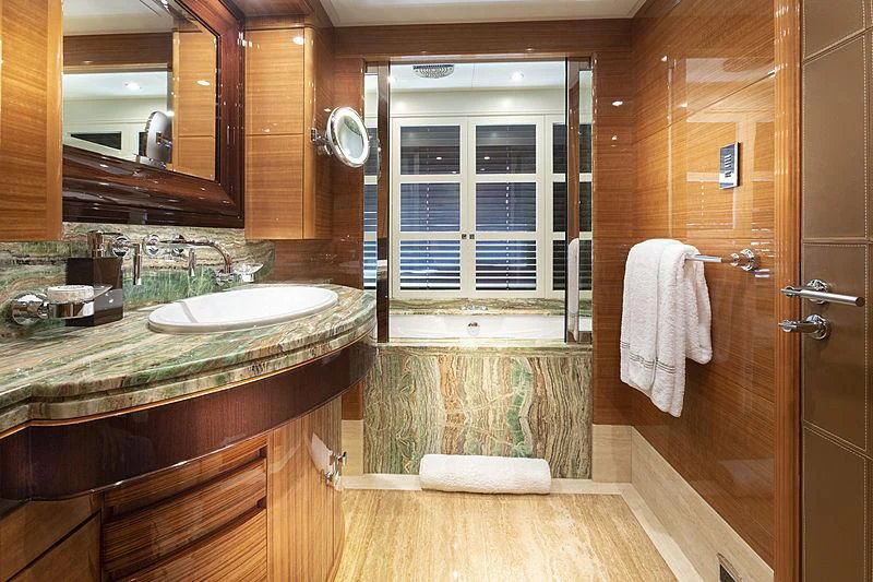 a bathroom with a sink and a shower aboard GROOVER Yacht for Sale