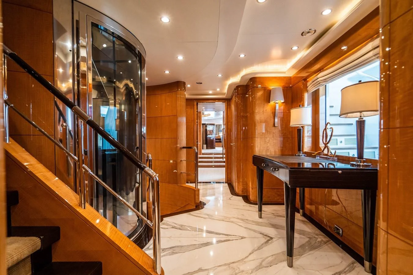 a room with a table and chairs aboard GROOVER Yacht for Sale