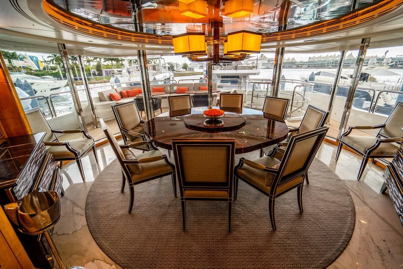 a restaurant with a table and chairs aboard GROOVER Yacht for Sale