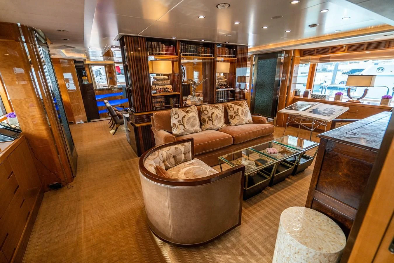 a living room with a large window aboard GROOVER Yacht for Sale