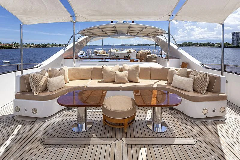 a couch and table on a boat aboard GROOVER Yacht for Sale