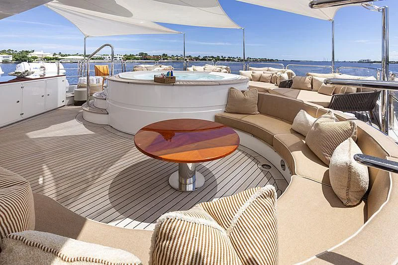 a large lounge area with a large bed and a large pool aboard GROOVER Yacht for Sale