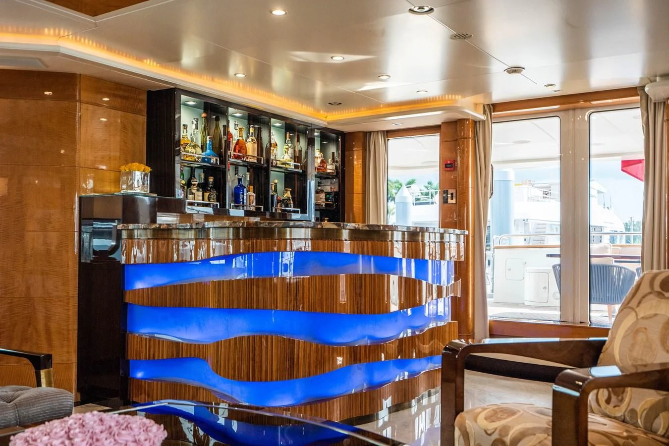 a room with a blue bed and a blue railing aboard GROOVER Yacht for Sale