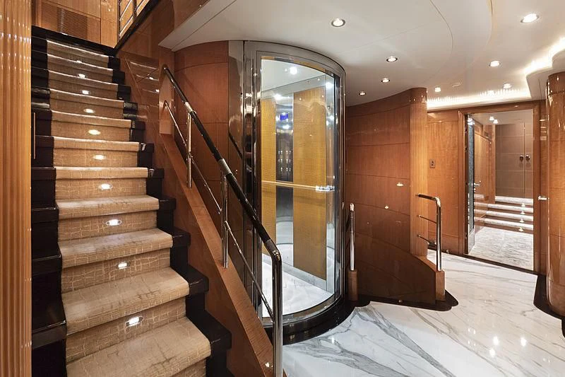 a wooden staircase in a house aboard GROOVER Yacht for Sale