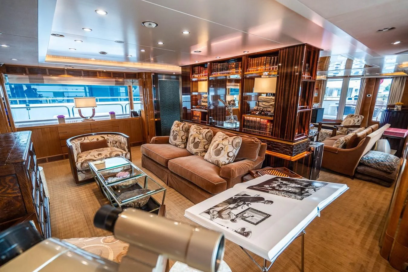a living room with a large window aboard GROOVER Yacht for Sale